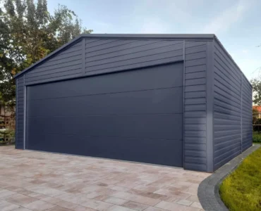 Doppelgarage aus Blech 600 x 580 cm Seitengiebel Sektionaltore Graphit