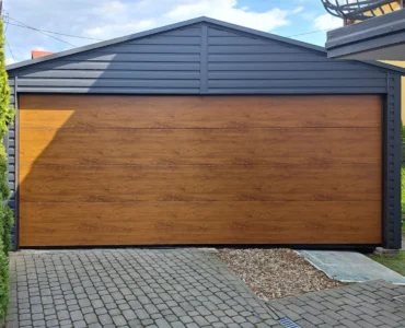 Doppelgarage aus Blech 590 x 500 cm Seitengiebel Sektionaltore Graphit